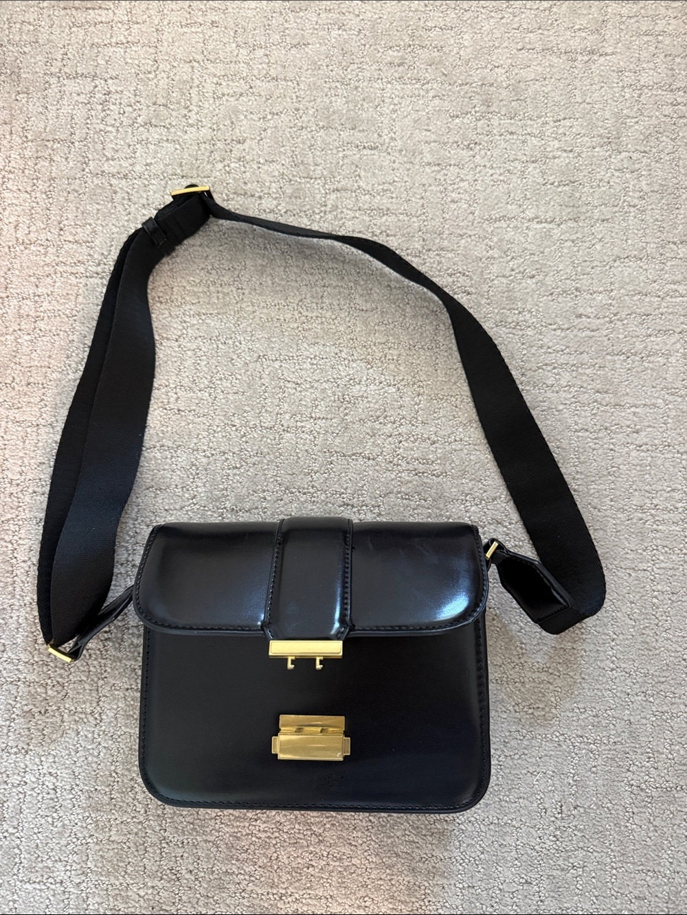 Classic Black Leather Crossbody Bag with Gold Hardware